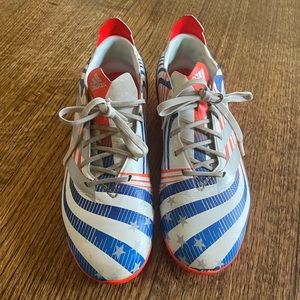 Adidas boys soccer/ football cleats. Size 4.5. Stylish with flair. Easy to spot